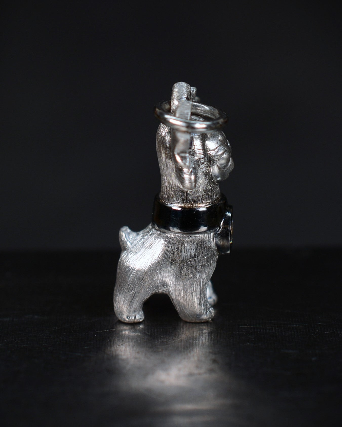 Bright Creature with blue antlers and a diamond and black rhodium collar.
