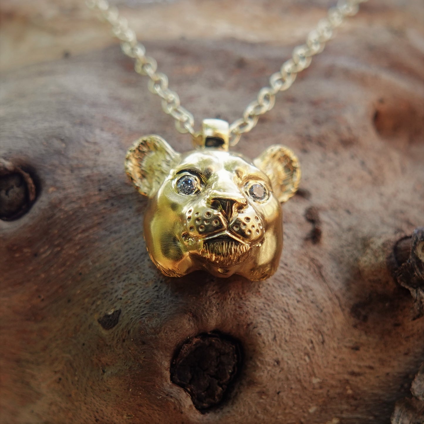 Little gold lioness necklace. Lioness head pendant and solid gold chain with diamond eyes. *This piece is ready to be shipped* © Adrian Ashley