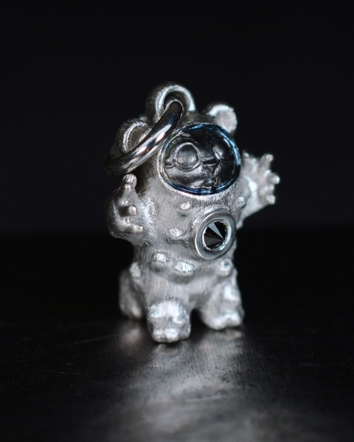 De Bears Cub Bright Creature with a black diamond and a black rhodium face.