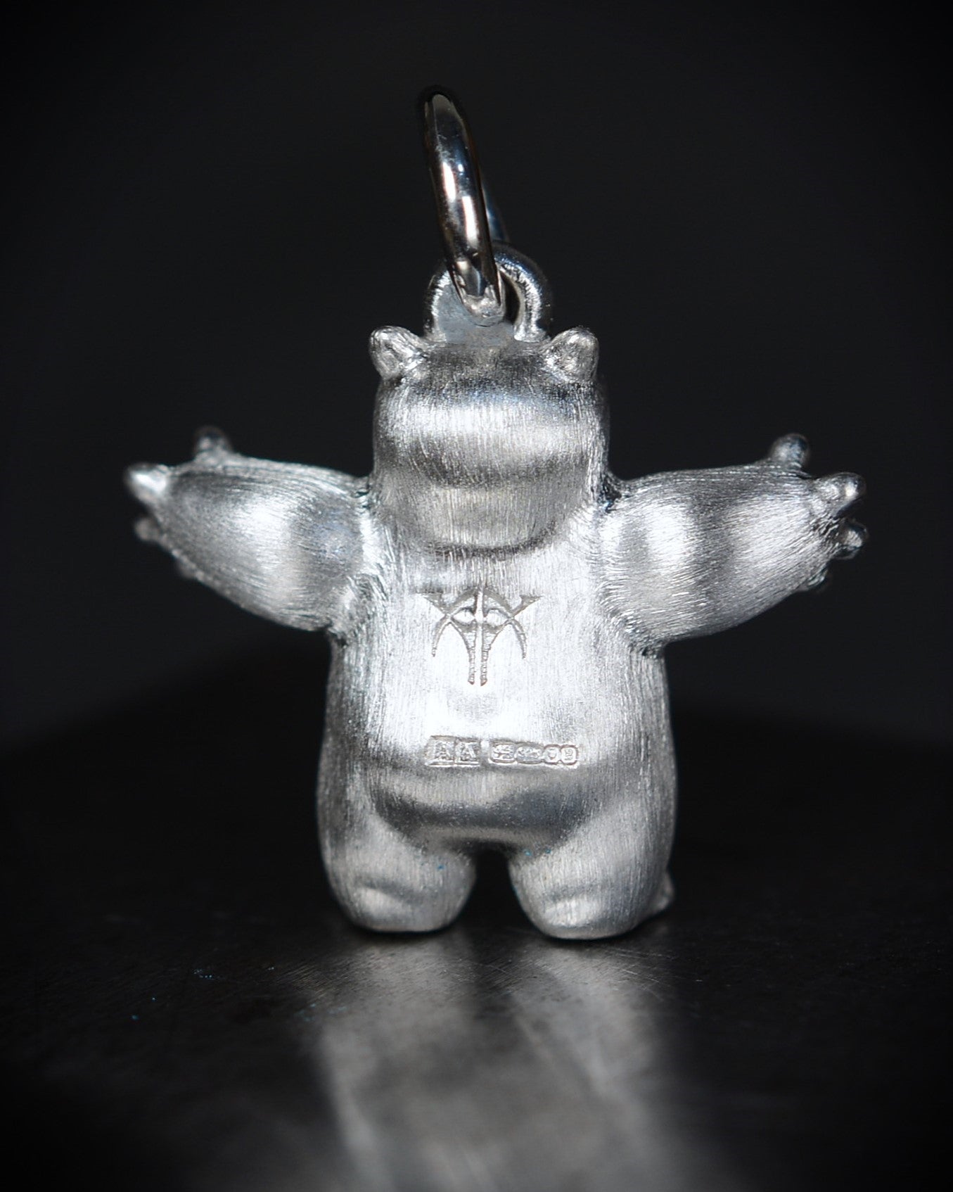 Happy chubby Bright Creature Companion Being with a star set diamond belly.