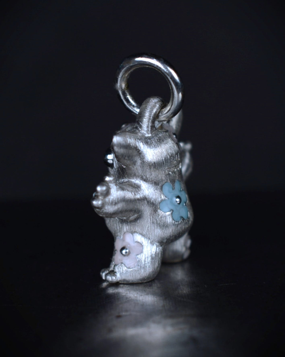 Flower Girl Creature set with a natural diamond.