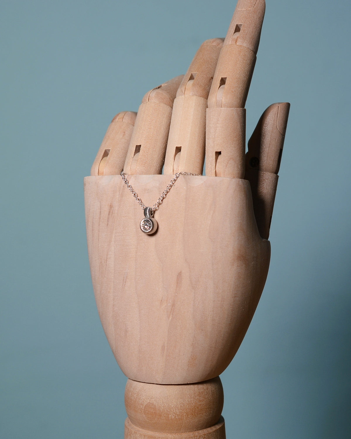 Pendant featuring a 0.38ct Old-cut diamond reclaimed from vintage jewellery.