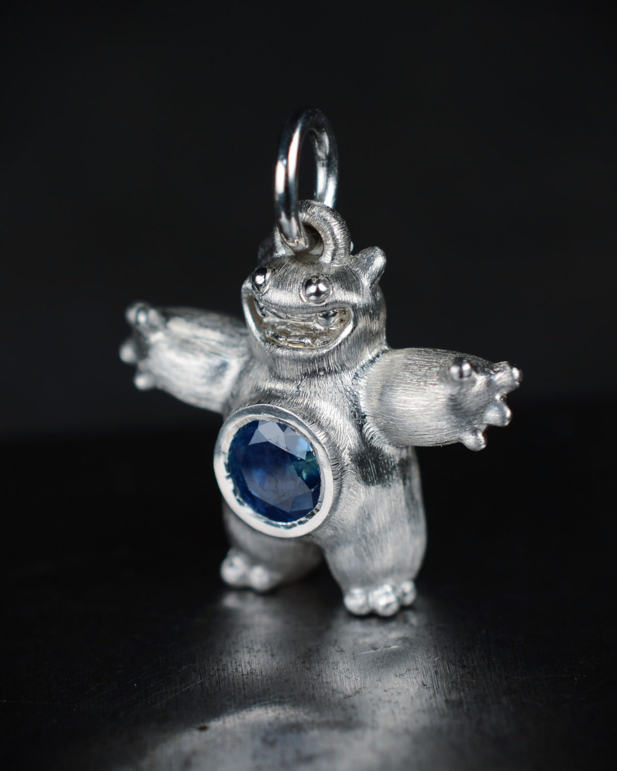 Happy chubby Bright Creature with a natural sapphire belly.