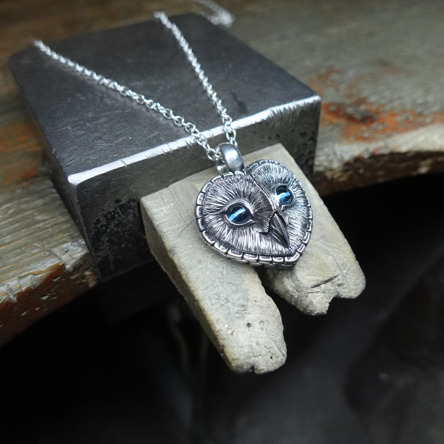 Blue eyed Barn Owl necklace, large sterling silver Barn Owl pendant with blue topaz eyes and a silver chain.  Hand made to order. © Adrian Ashley