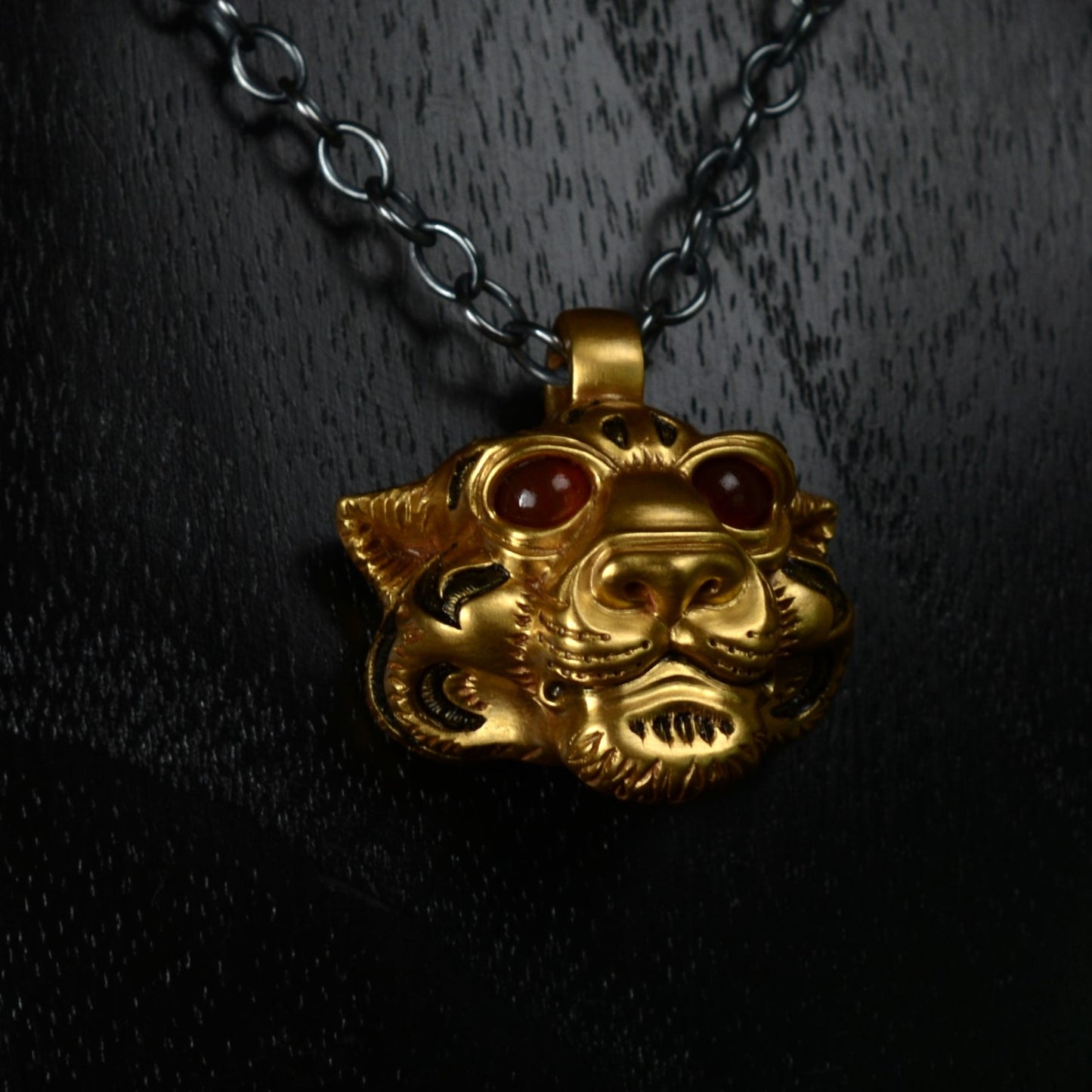 Gold Vermeil Tiger Necklace. Sterling silver tiger head pendant gemstone eyes and a silver chain. *This piece is ready to be shipped* © Adrian Ashley