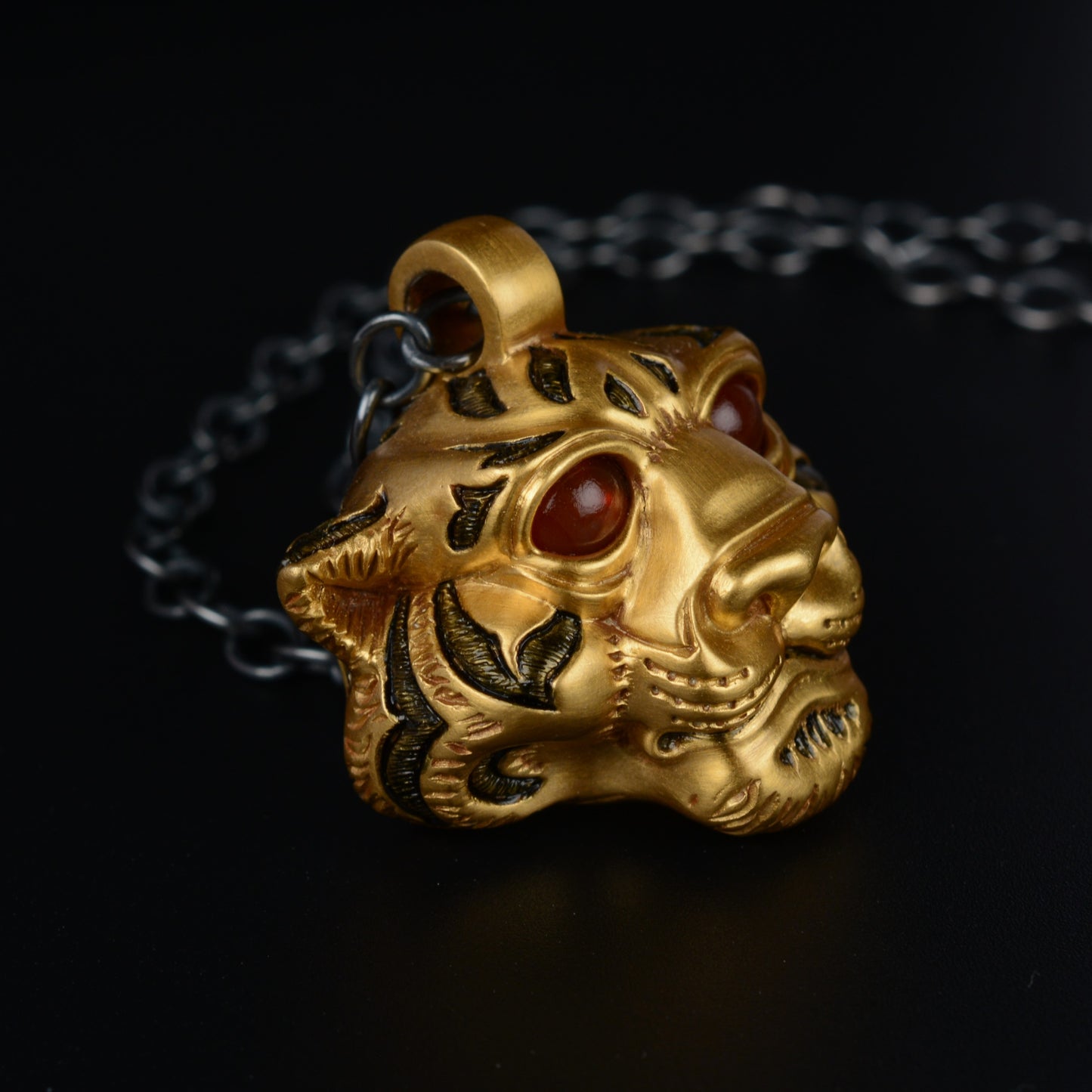 Gold Vermeil Tiger Necklace. Sterling silver tiger head pendant gemstone eyes and a silver chain. *This piece is ready to be shipped* © Adrian Ashley