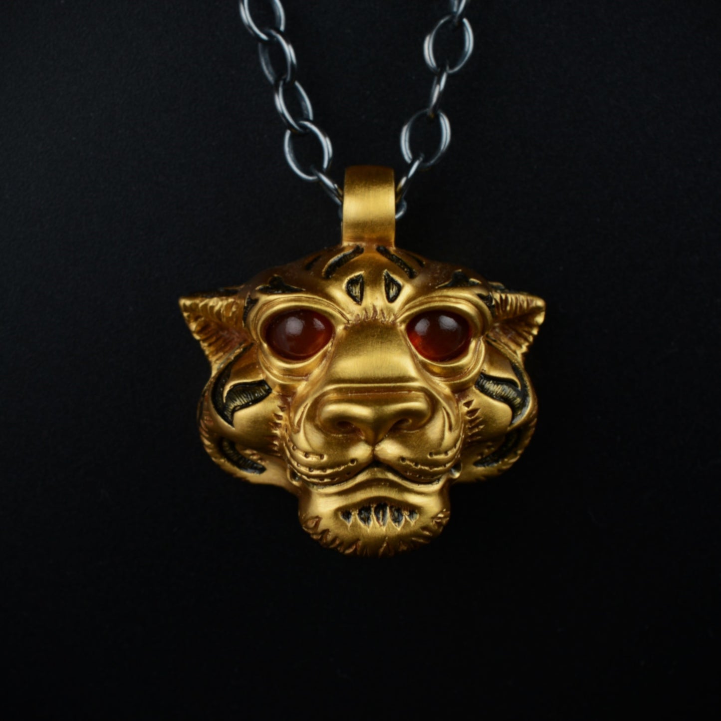 Gold Vermeil Tiger Necklace. Sterling silver tiger head pendant gemstone eyes and a silver chain. *This piece is ready to be shipped* © Adrian Ashley