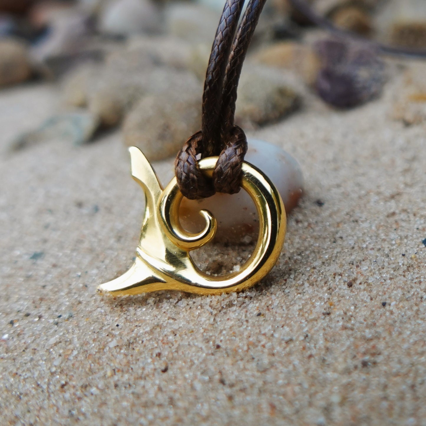Shark tail necklace. Solid yellow gold shark's tail design. This piece will be handmade for you. © Adrian Ashley