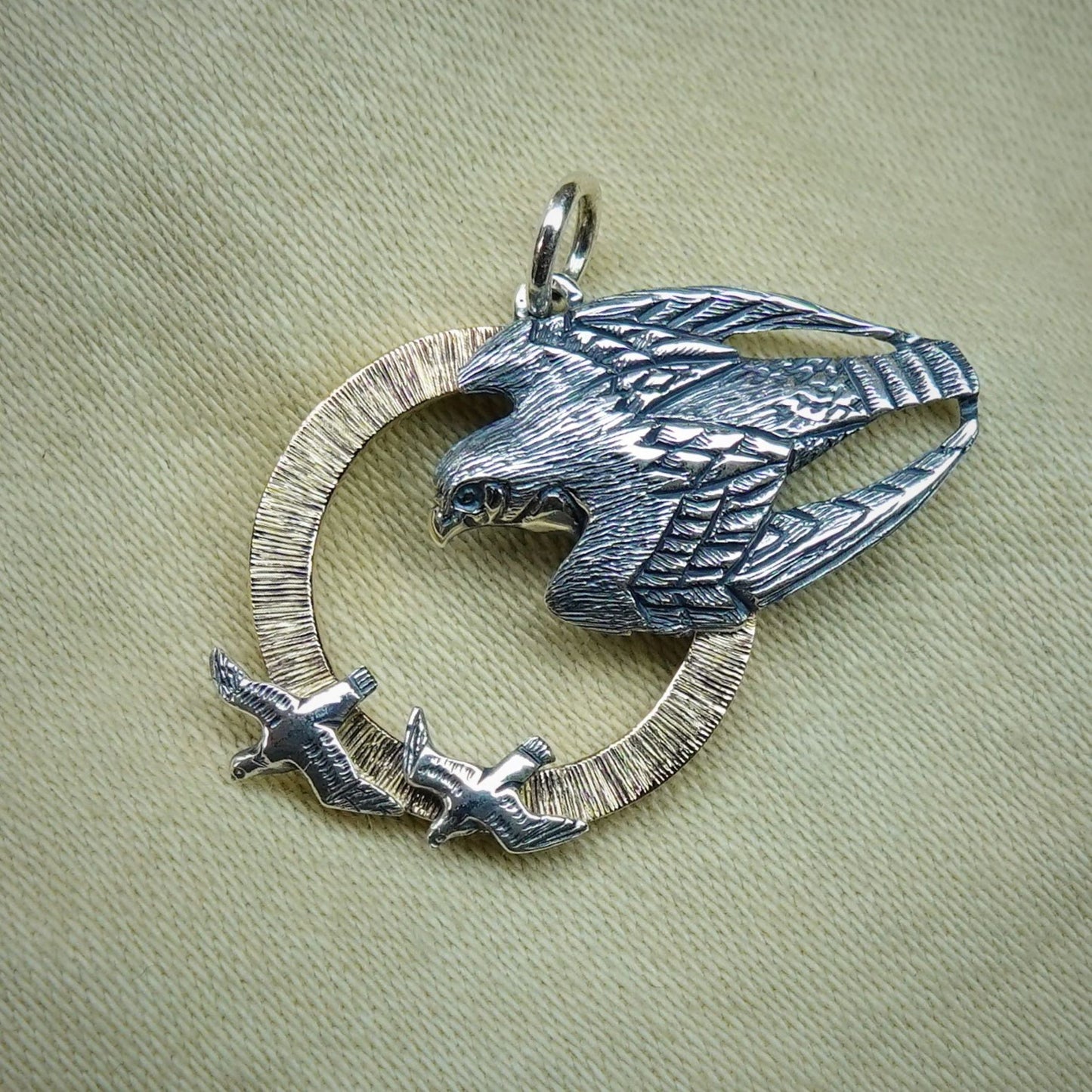 Peregrine Falcon necklace, solid gold and silver raptor pendant, as seen on TV. Hand made to order in the UK © Argent Aqua