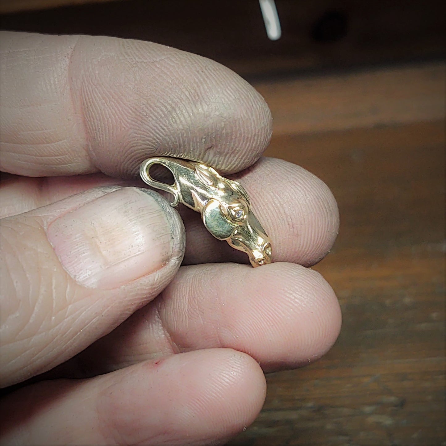 Horse necklace. Gold horse head pendant. Diamond eyed equestrian jewellery on a gold chain. Handmade to order. © Adrian Ashley