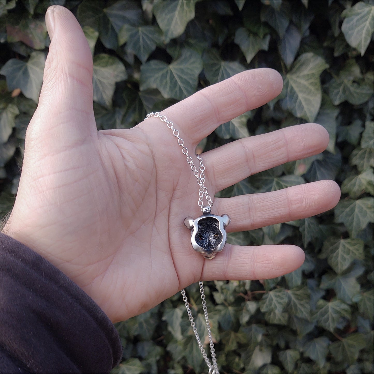 Silver lioness necklace. Lioness head pendant and solid silver chain with citrine eyes. Handmade to order. © Adrian Ashley