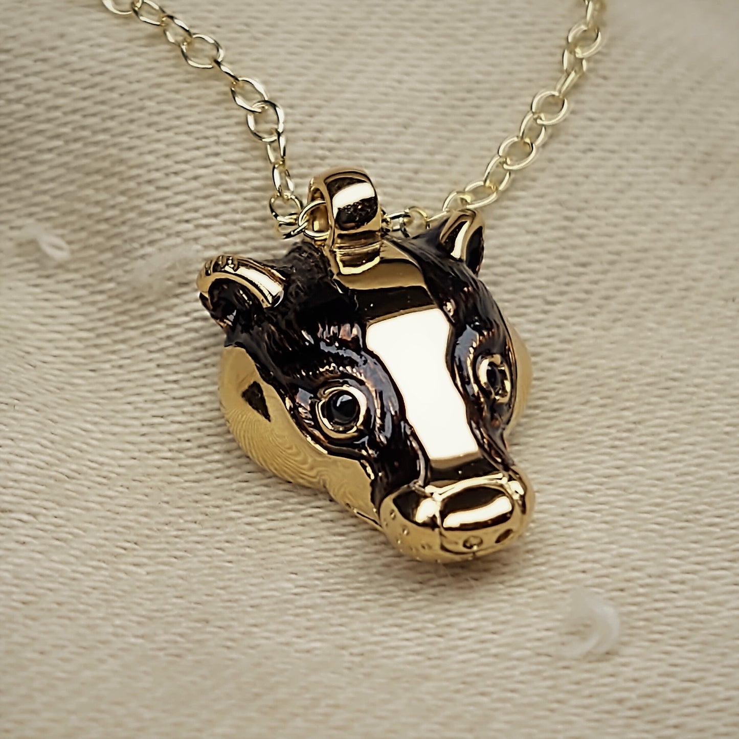 Badger Necklace, gold and natural sapphire pendant with a solid gold chain. This piece will be hand made for you in the UK. © Adrian Ashley