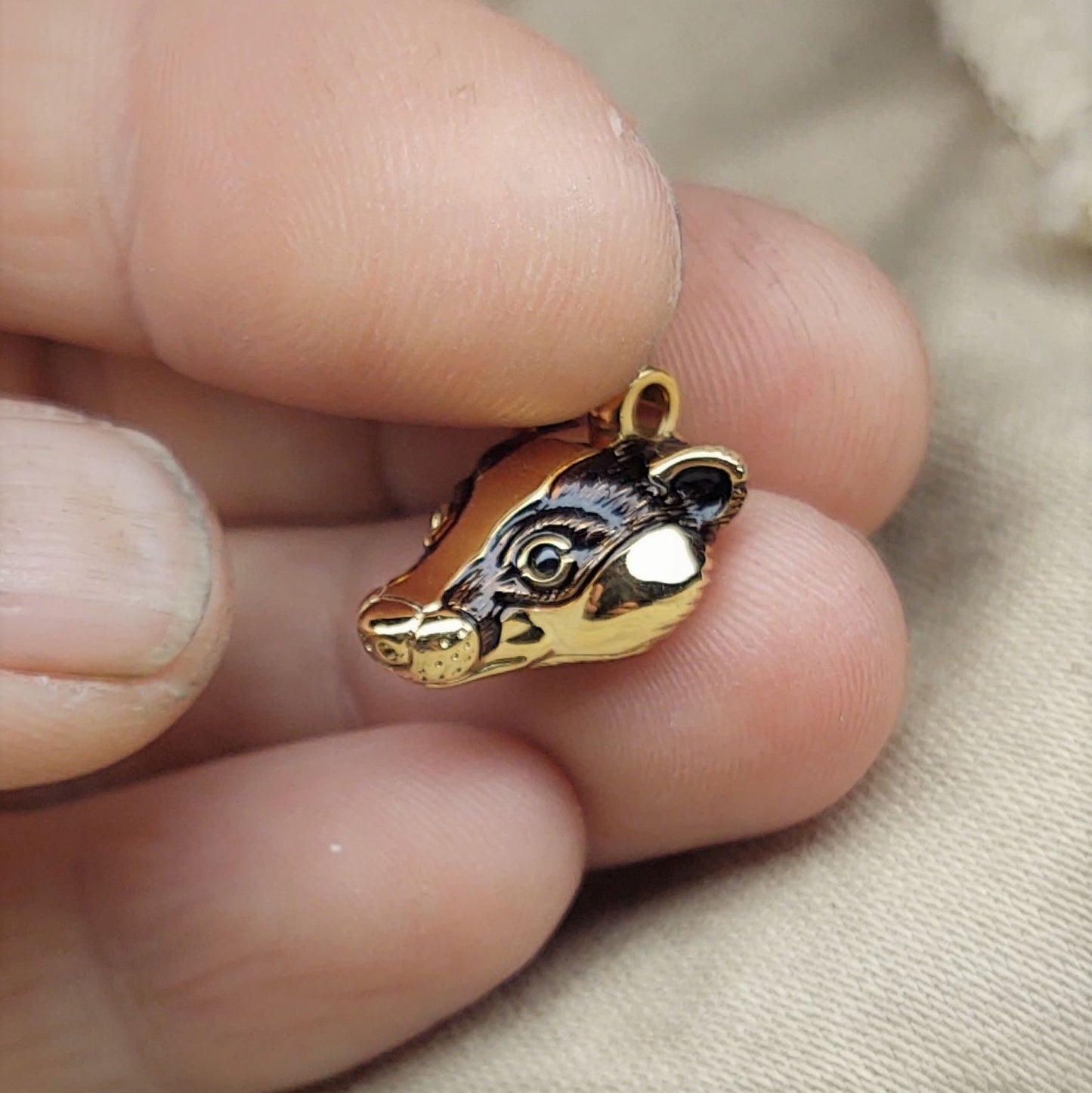 Badger Necklace, gold and natural sapphire pendant with a solid gold chain. This piece will be hand made for you in the UK. © Adrian Ashley