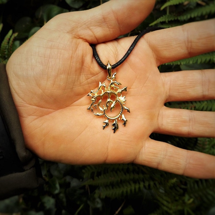 Sea dragon necklace. Solid gold leafy sea dragon pendant. Double sided marine life artwork. © Adrian Ashley