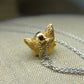 Solid 22ct gold fox pendant and platinum chain. Handmade to order. © Adrian Ashley