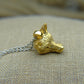 Solid 22ct gold fox pendant and platinum chain. Handmade to order. © Adrian Ashley