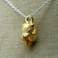 Solid 22ct gold badger pendant and platinum chain. Handmade to order. © Adrian Ashley