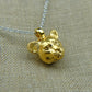 Solid 22ct gold lioness pendant and platinum chain. Handmade to order. © Adrian Ashley