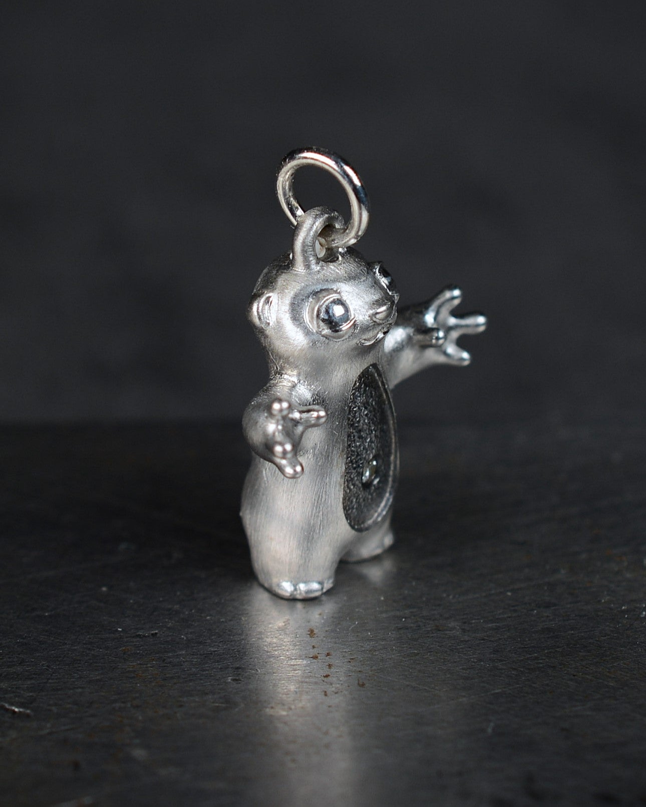 Stoat type Bright Creature with an anthracite-grey belly.