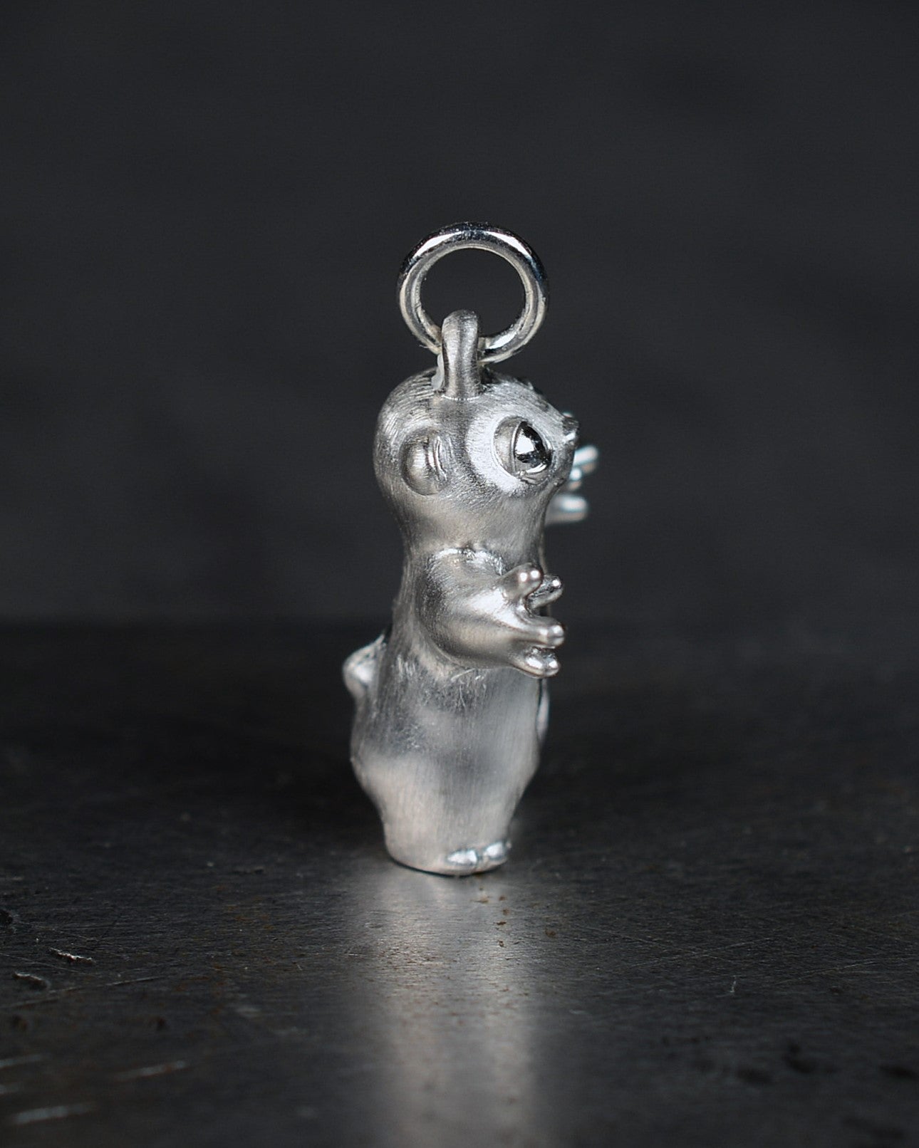 Stoat type Bright Creature with an anthracite-grey belly.