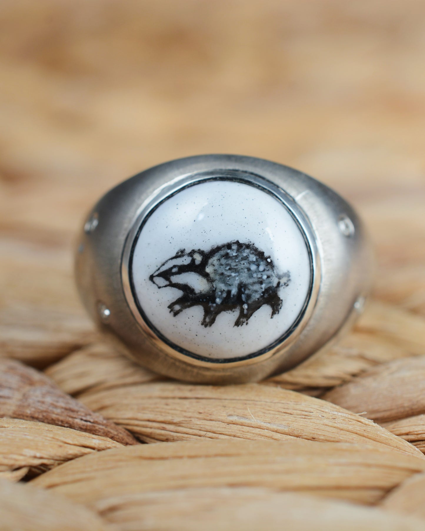 Enamelled badger ring set with diamonds