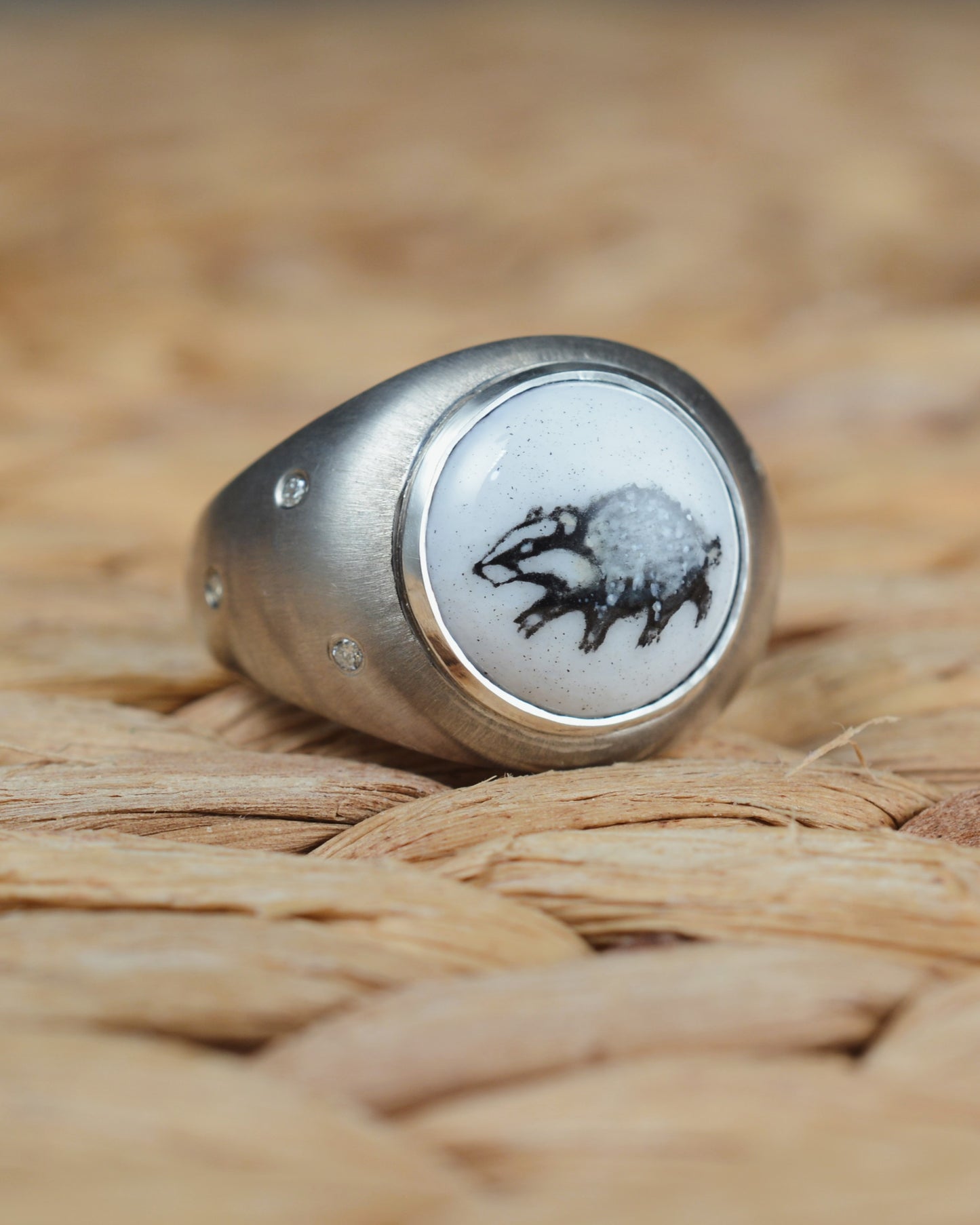 Enamelled badger ring set with diamonds