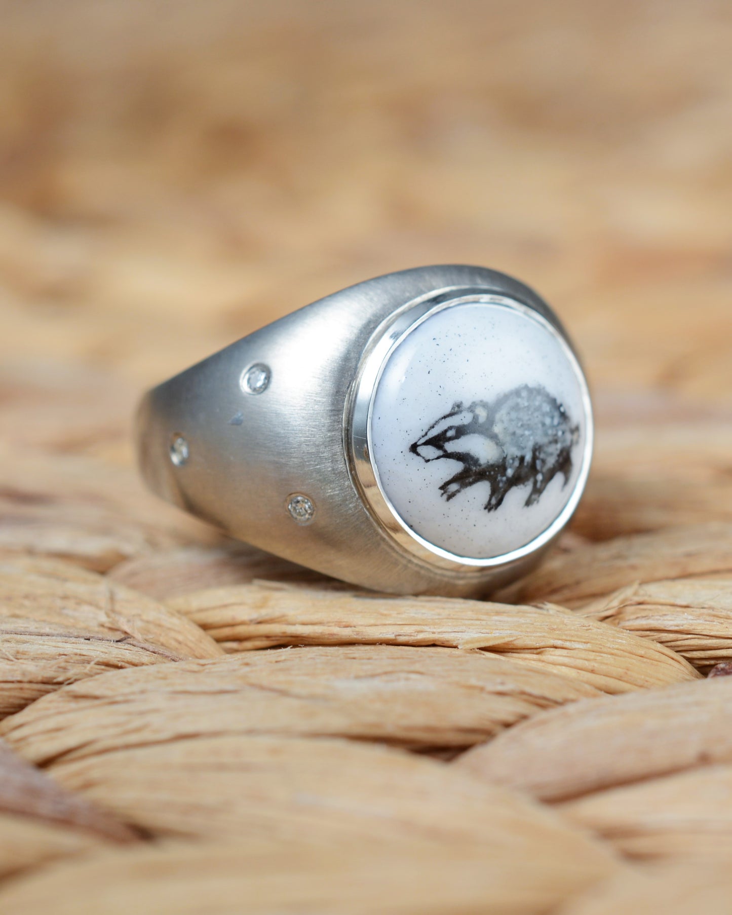 Enamelled badger ring set with diamonds