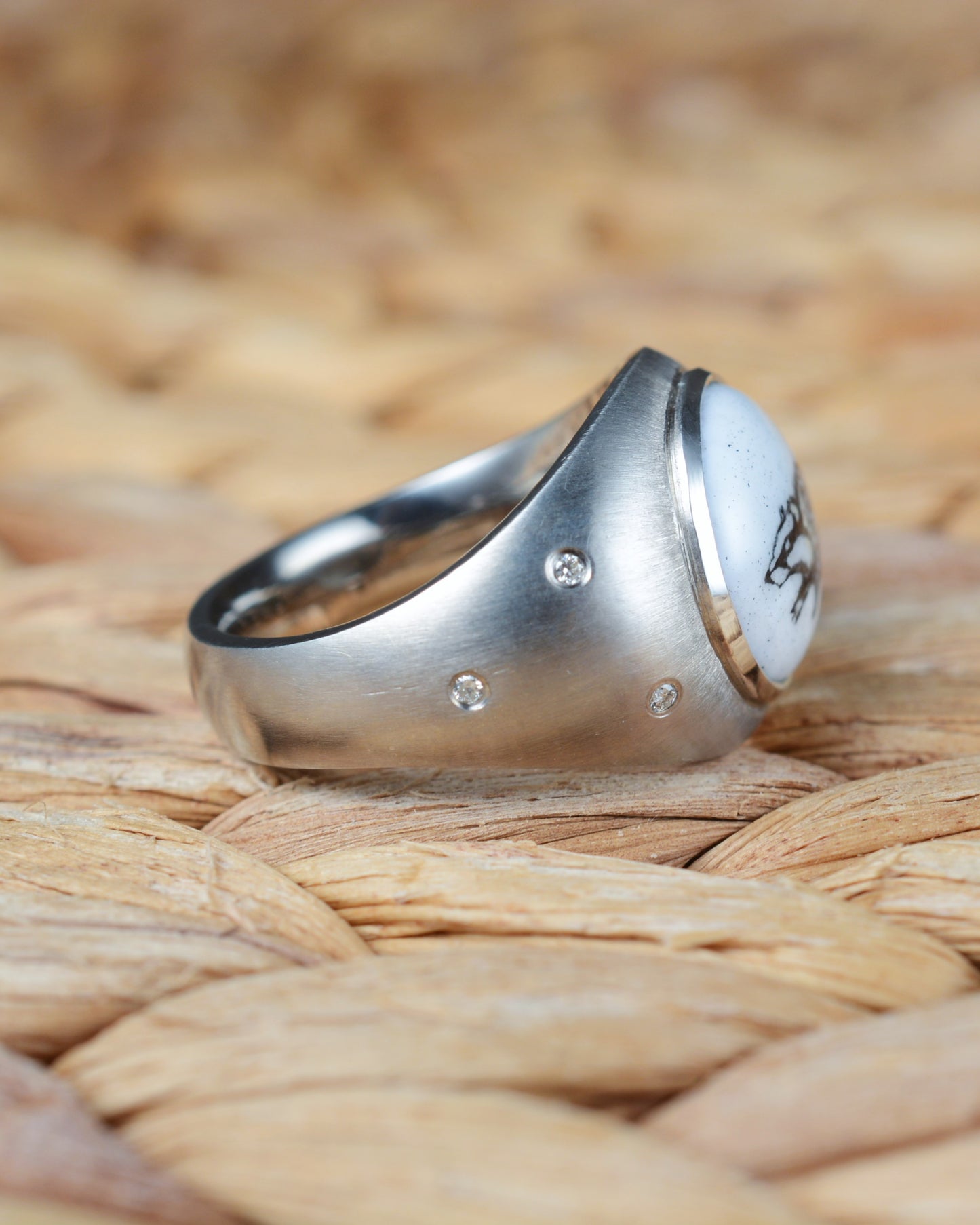 Enamelled badger ring set with diamonds