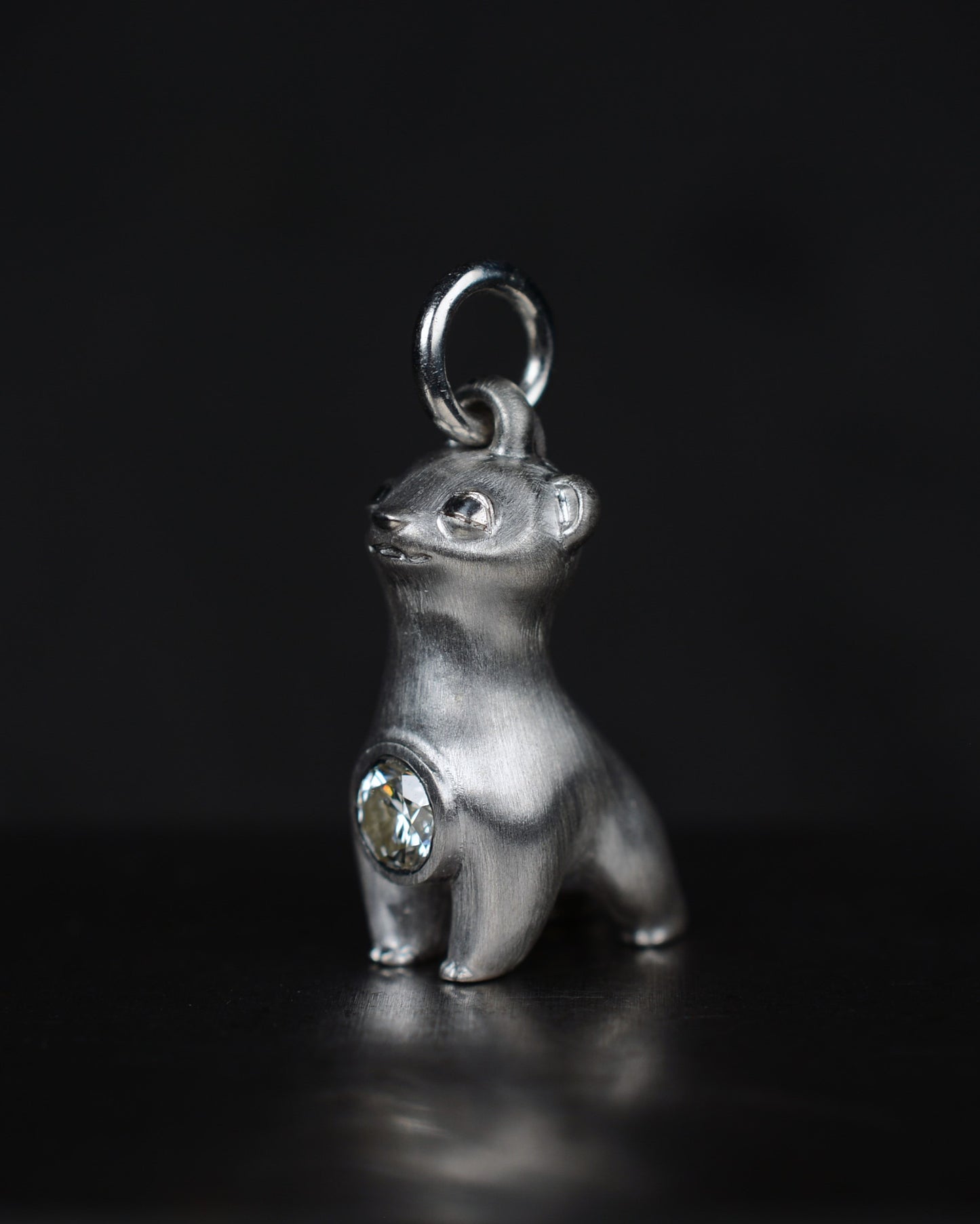 Stoat type Bright Creature with a 0.25ct natural diamond.
