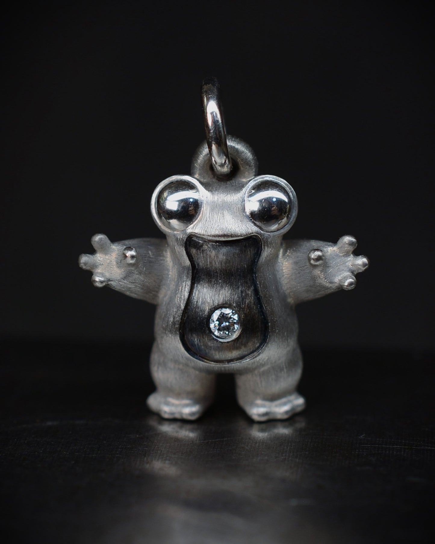 Frog type Bright Creature with a diamond and black rhodium.
