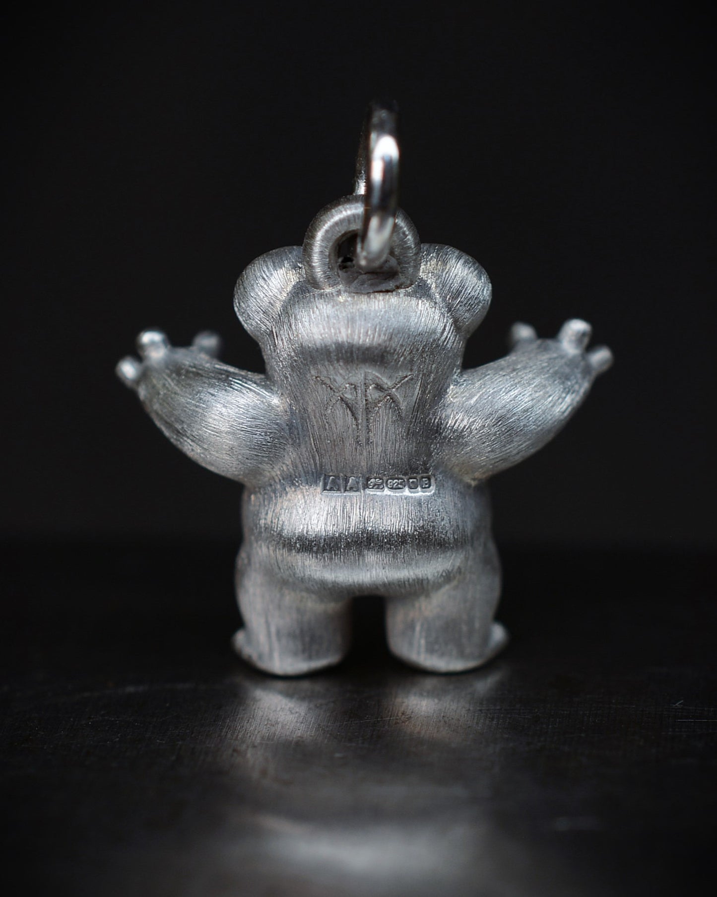 Frog type Bright Creature with a diamond and black rhodium.