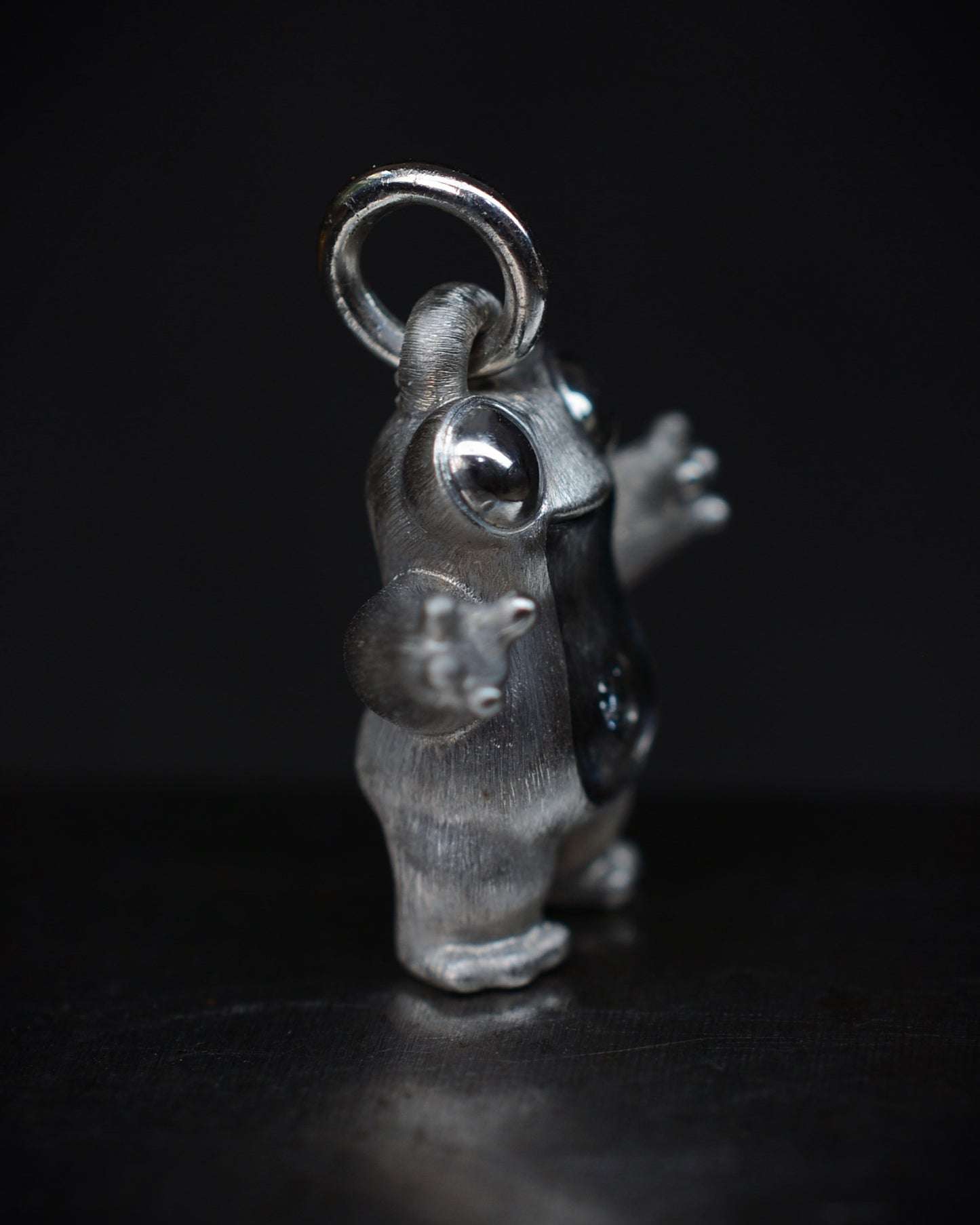 Frog type Bright Creature with a diamond and black rhodium.