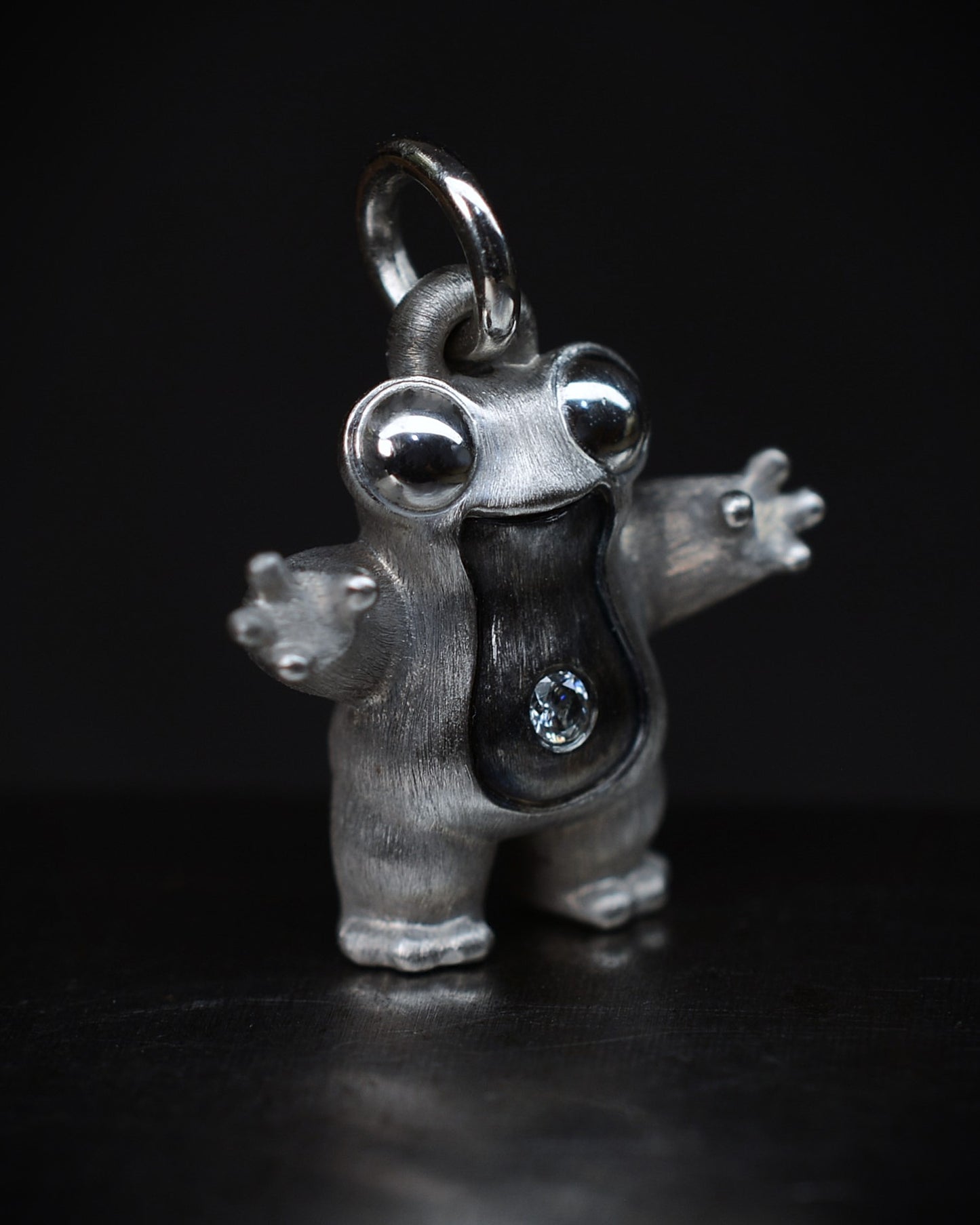 Frog type Bright Creature with a diamond and black rhodium.