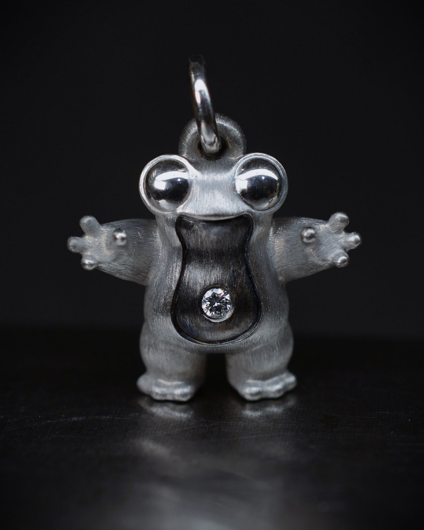Frog type Bright Creature with a diamond and black rhodium.