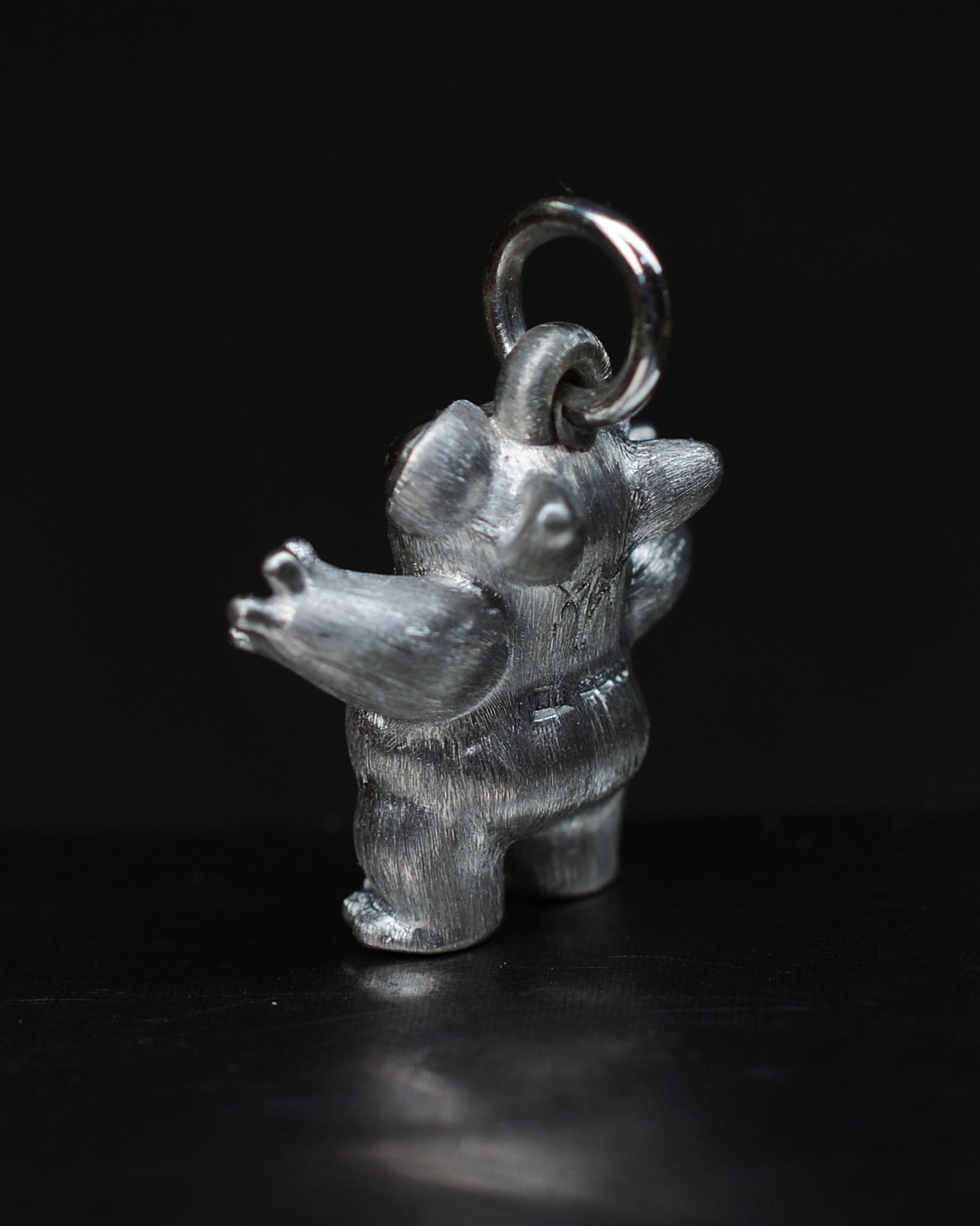 Black Star tarsier type Bright Creature with a diamond and black rhodium.