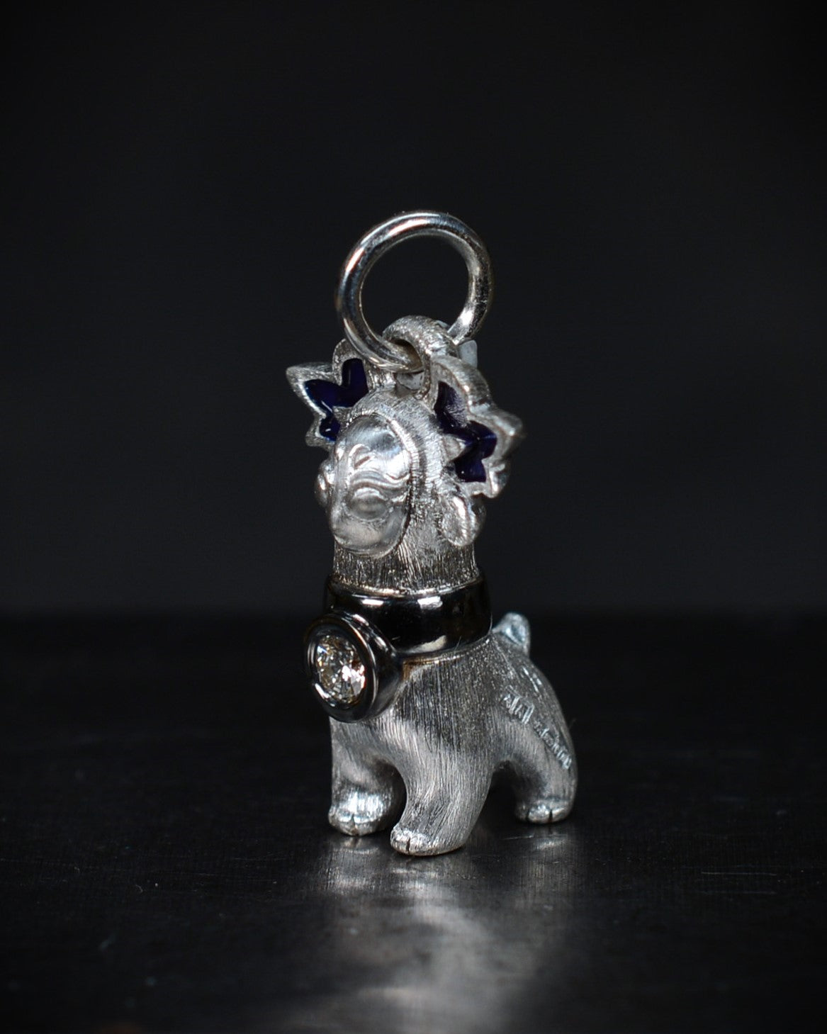 Bright Creature with blue antlers and a diamond and black rhodium collar.