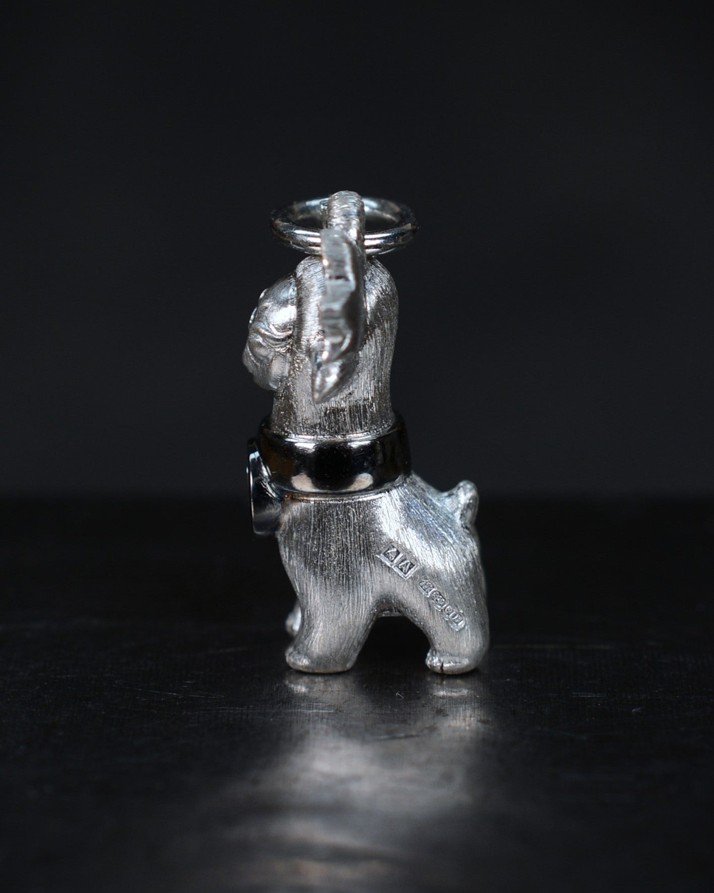 Bright Creature with blue antlers and a diamond and black rhodium collar.