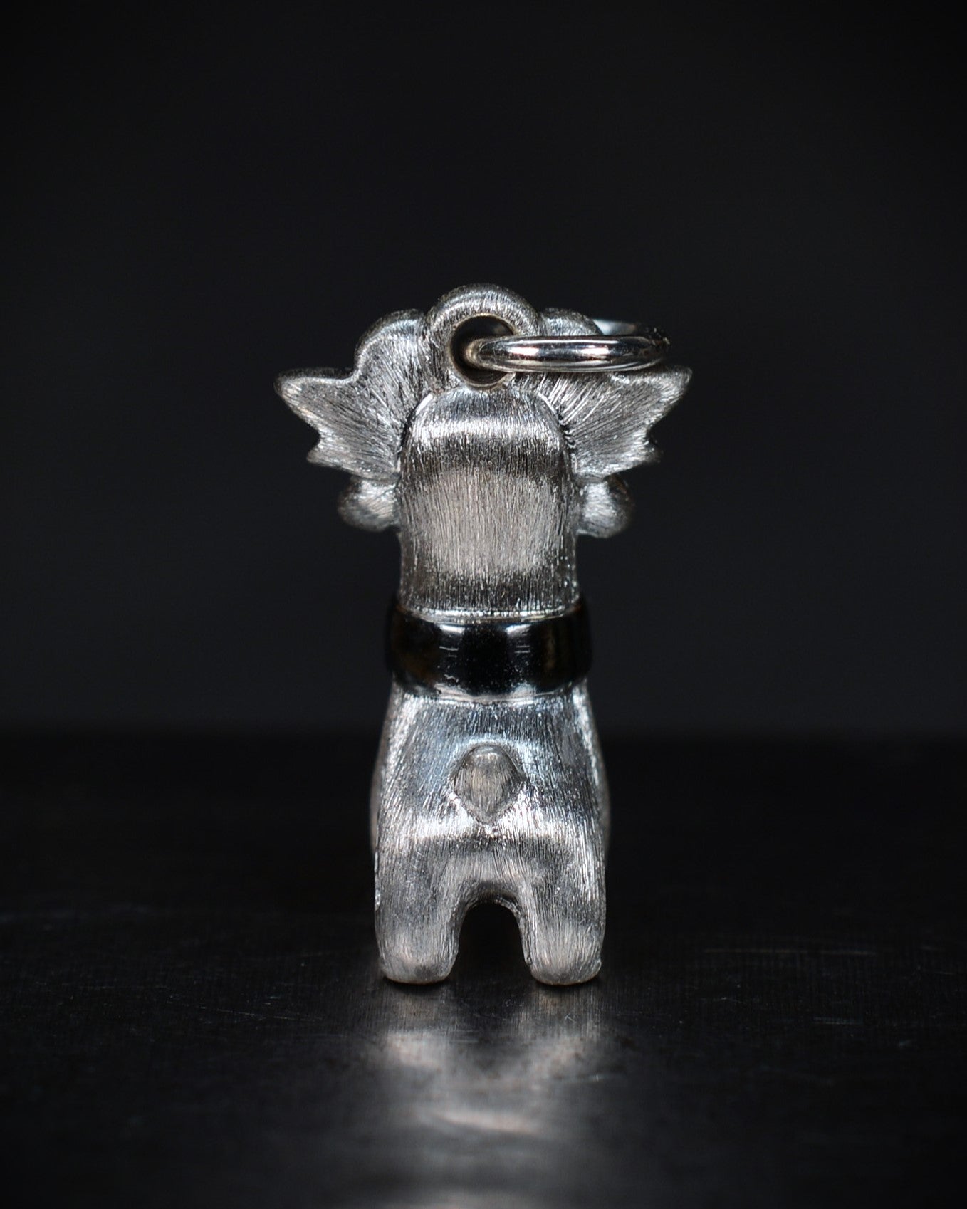 Bright Creature with blue antlers and a diamond and black rhodium collar.