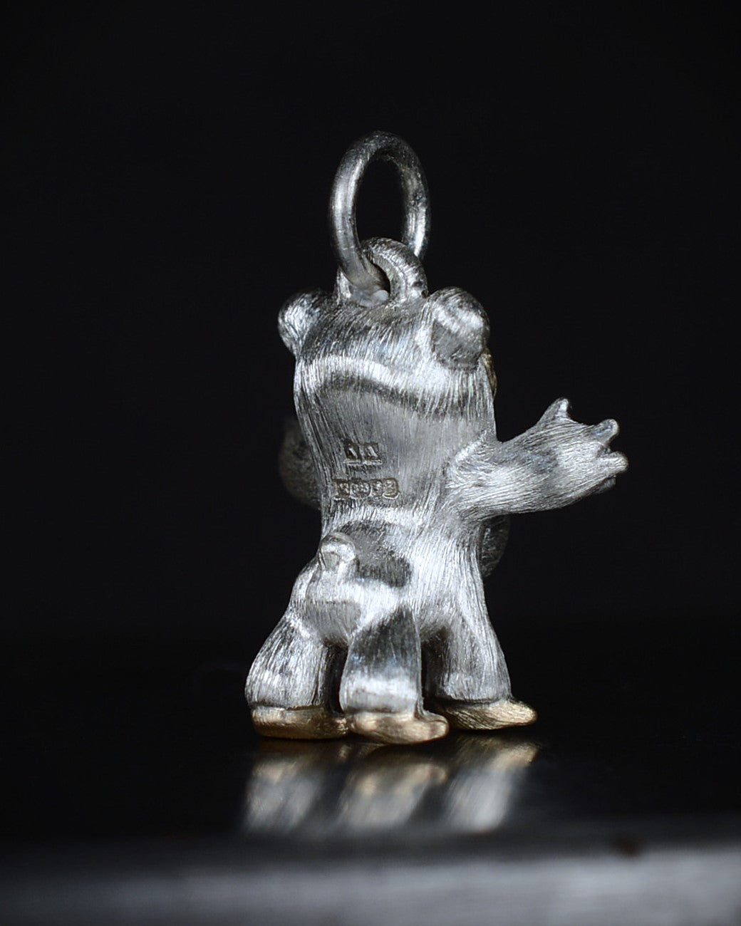 Centaur Bear Creature with a gold face & feet set with a natural old-cut diamond.