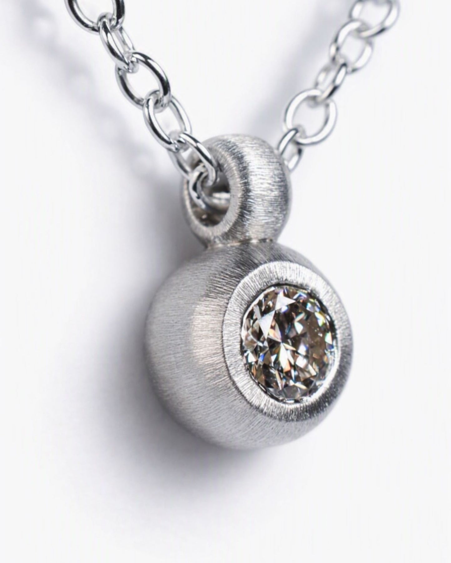 Pendant featuring a 0.26ct natural whiskey coloured diamond reclaimed from vintage jewellery.