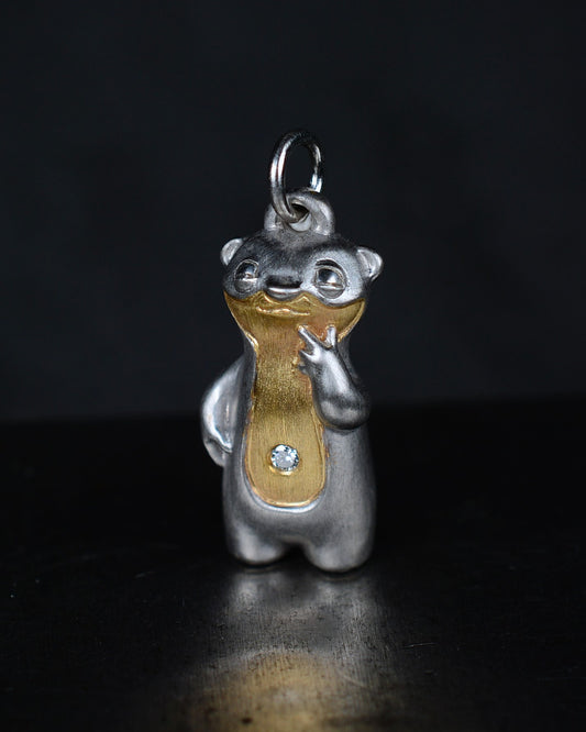 Contemplative Stoat type Bright Creature with a diamond and parcel gilt.