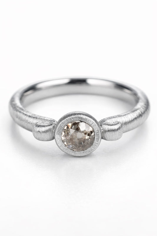 Old-cut diamond ring featuring a 0.64ct natural diamond reclaimed from vintage jewellery.