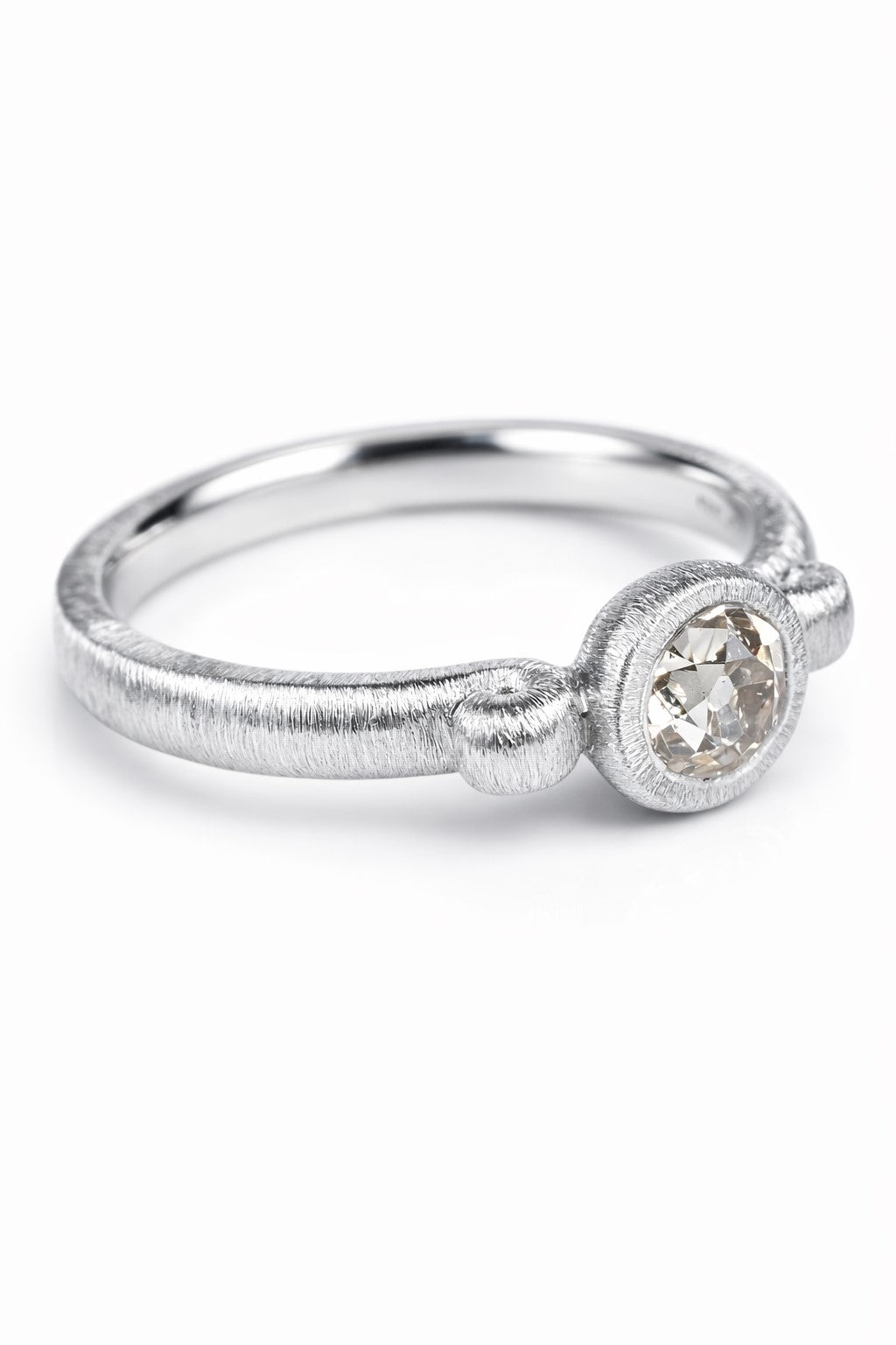 Old-cut diamond ring featuring a 0.64ct natural diamond reclaimed from vintage jewellery.
