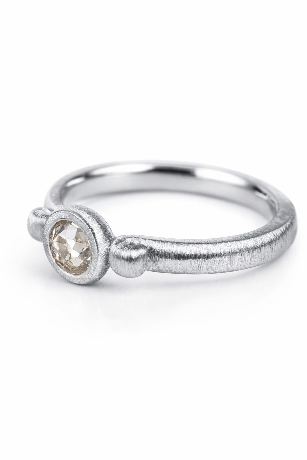 Old-cut diamond ring featuring a 0.64ct natural diamond reclaimed from vintage jewellery.