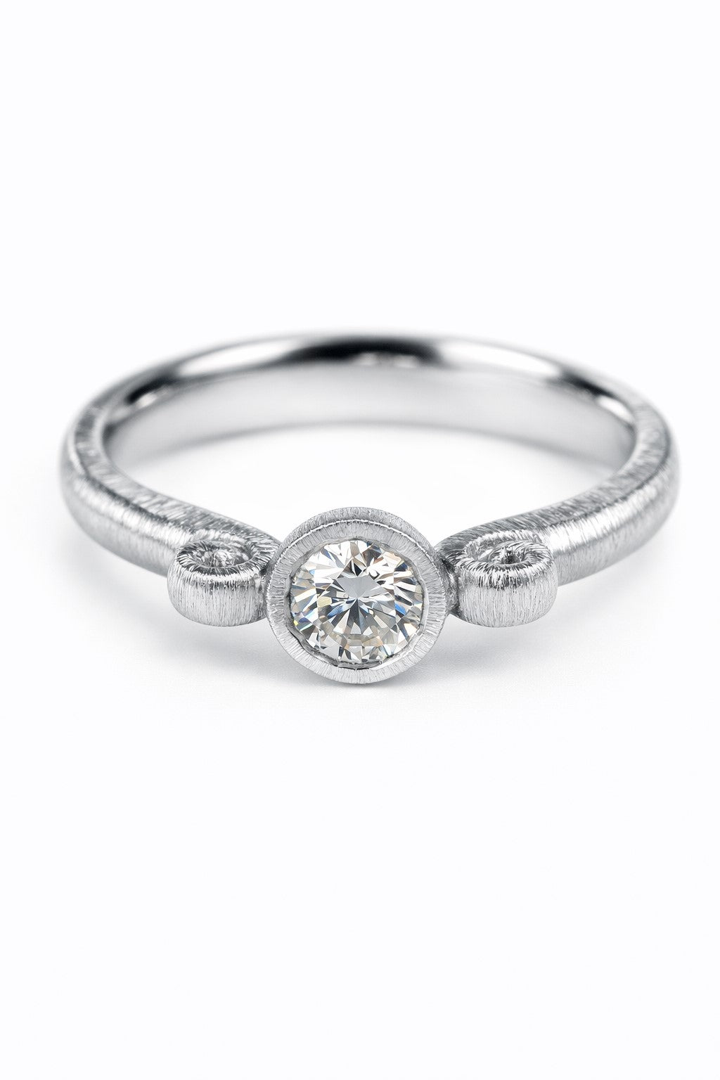 Diamond ring featuring a 0.26ct natural diamond reclaimed from vintage jewellery.