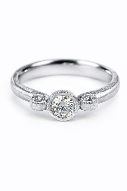 Diamond ring featuring a 0.26ct natural diamond reclaimed from vintage jewellery.