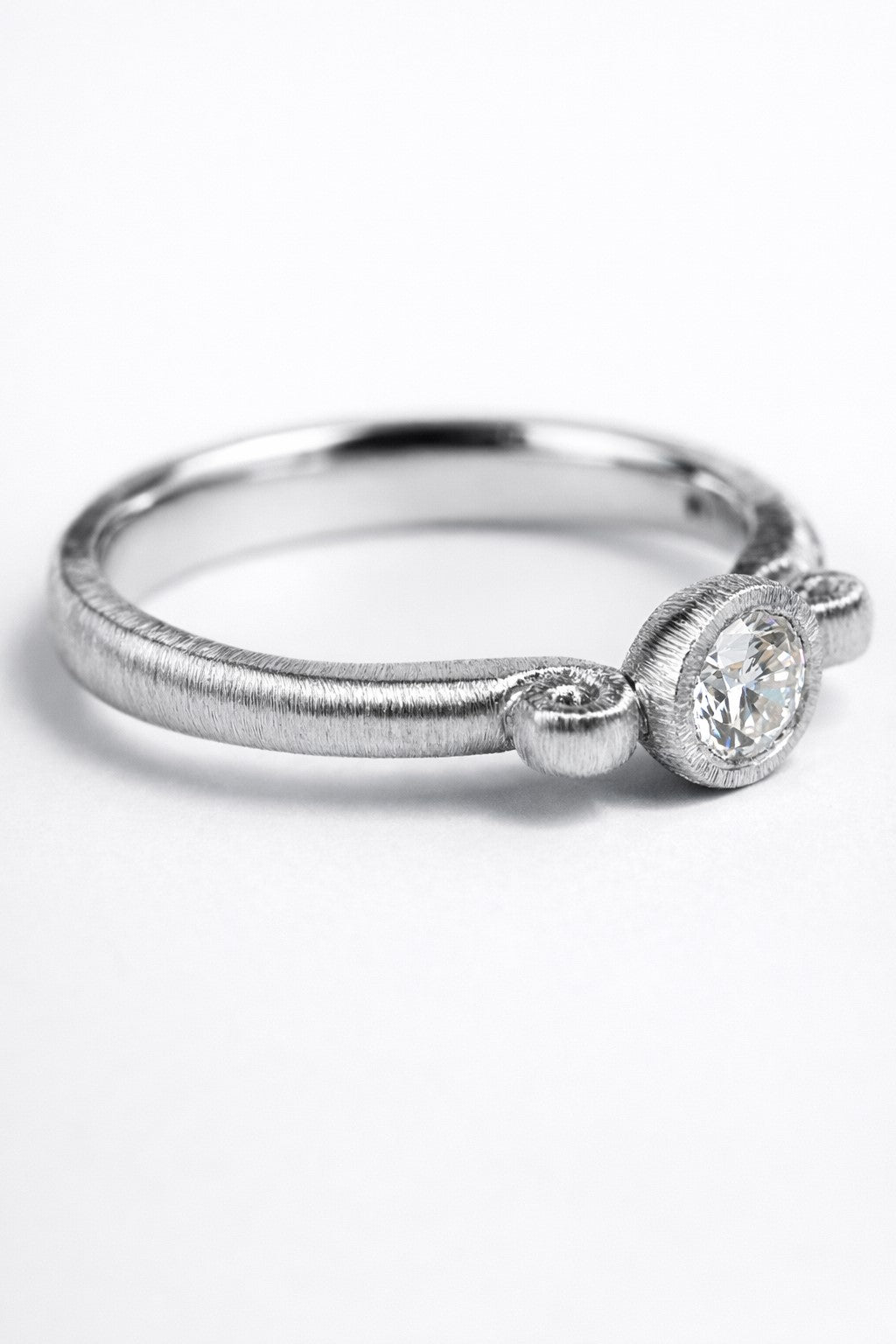 Diamond ring featuring a 0.26ct natural diamond reclaimed from vintage jewellery.