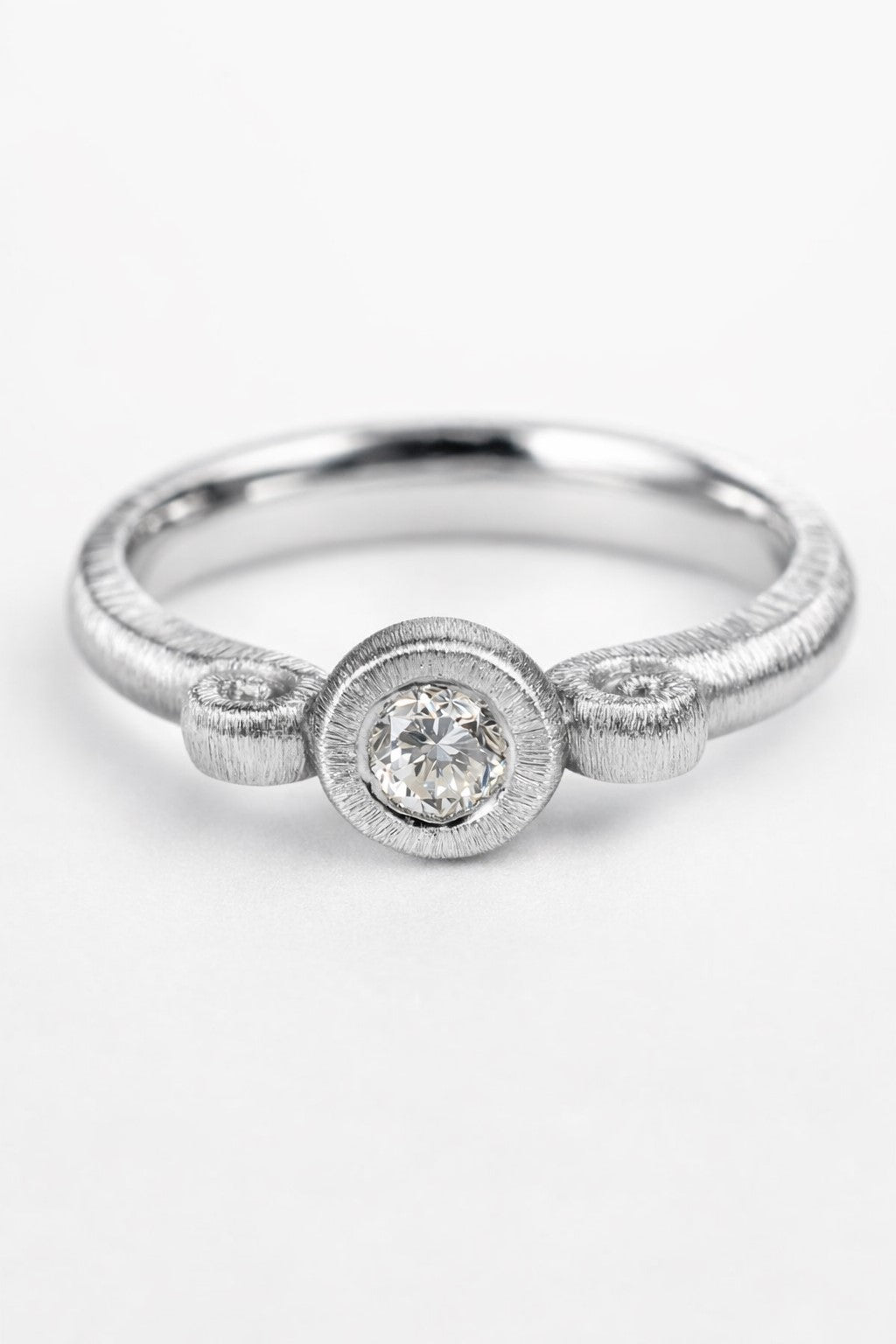 Diamond ring featuring a 0.15ct natural diamond reclaimed from vintage jewellery.