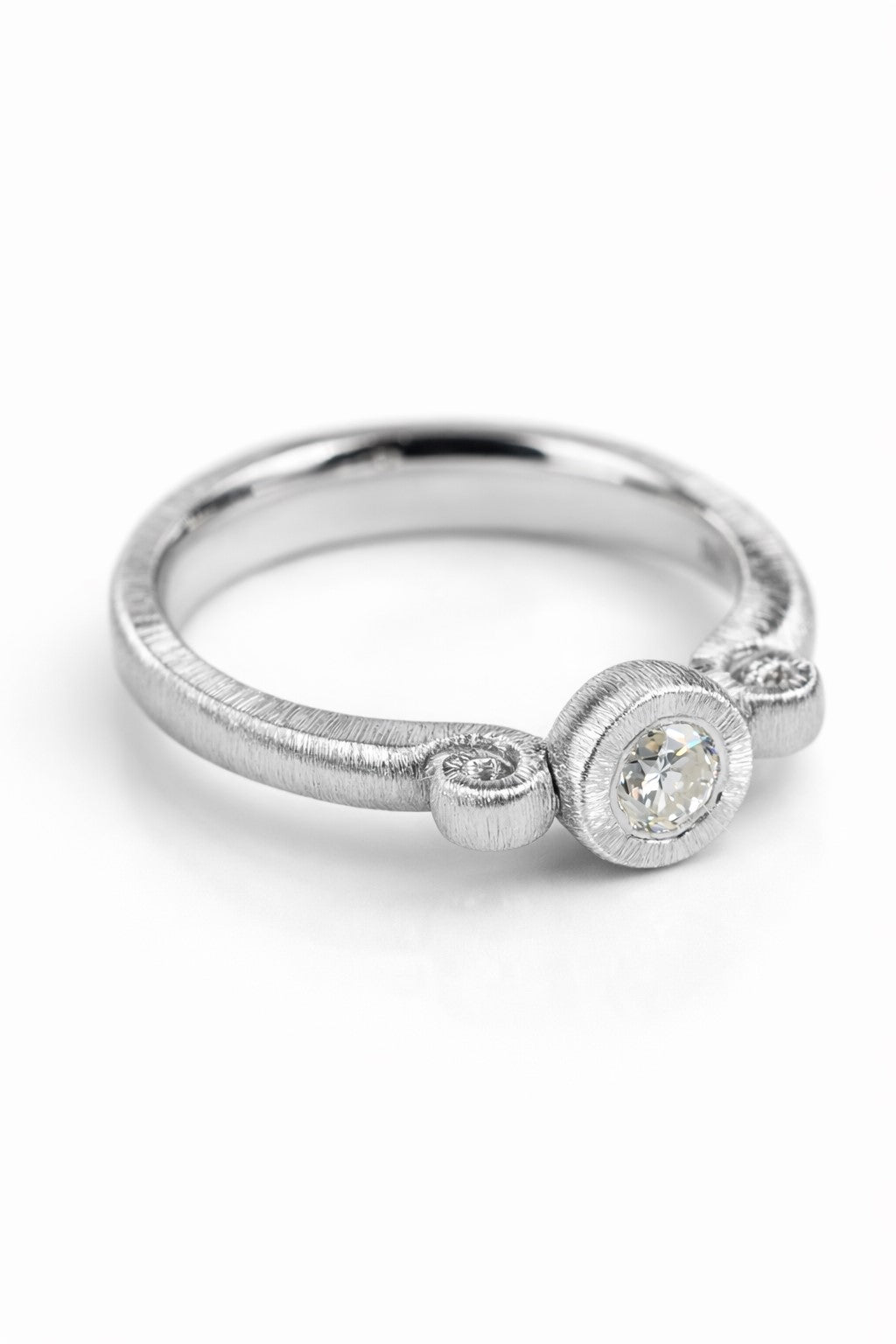 Diamond ring featuring a 0.15ct natural diamond reclaimed from vintage jewellery.
