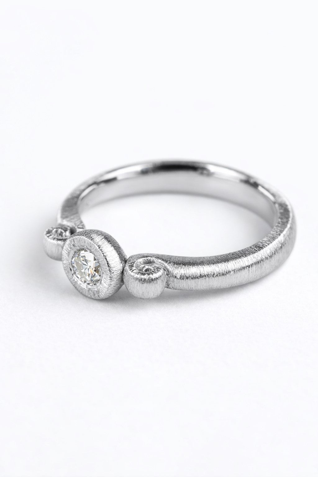 Diamond ring featuring a 0.15ct natural diamond reclaimed from vintage jewellery.